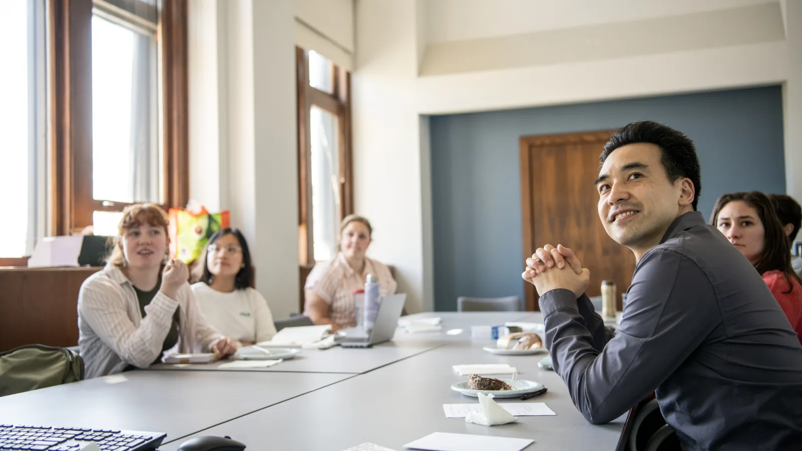 Individuals around a conference table