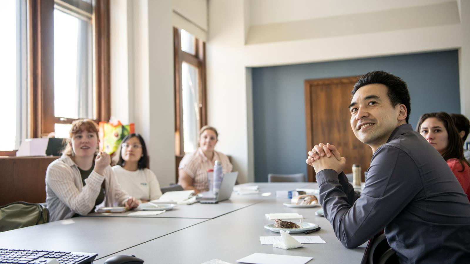 Individuals around a conference table