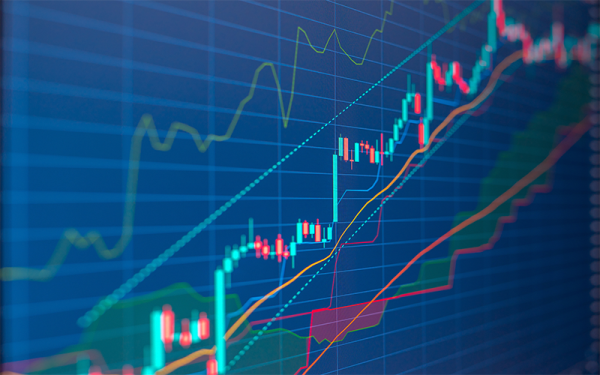 Closeup financial chart with uptrend line candlestick graph in stock market